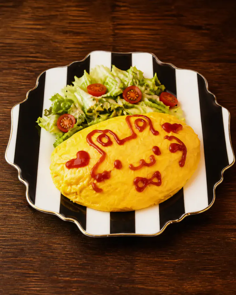 Magic fluffy omurice decorated with ketchup art